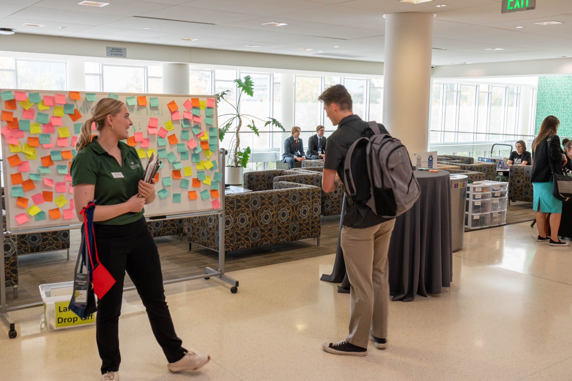 Students talking at Colorado State University career fair.